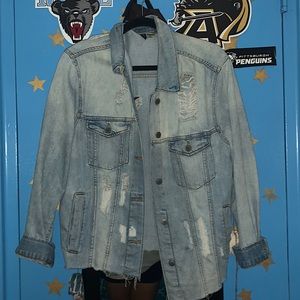 homemade ripped and stitched denim jacket